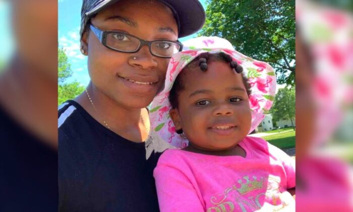 27-year-old woman identified on her GoFundMe page as Tiana holding her 3-year-old daughter Zyana Corbin. (GoFundMe)
