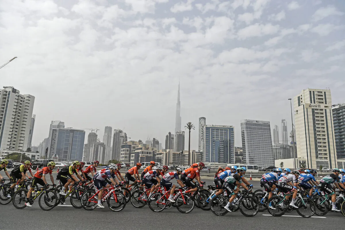 The pack pedals during the fourth stage of the tour of United Arab Emirates cycling race, from Zabeel Park to Dubai City Walk, in United Arab Emirates on Feb. 26, 2020. (Massimo Paolone/LaPresse via AP)