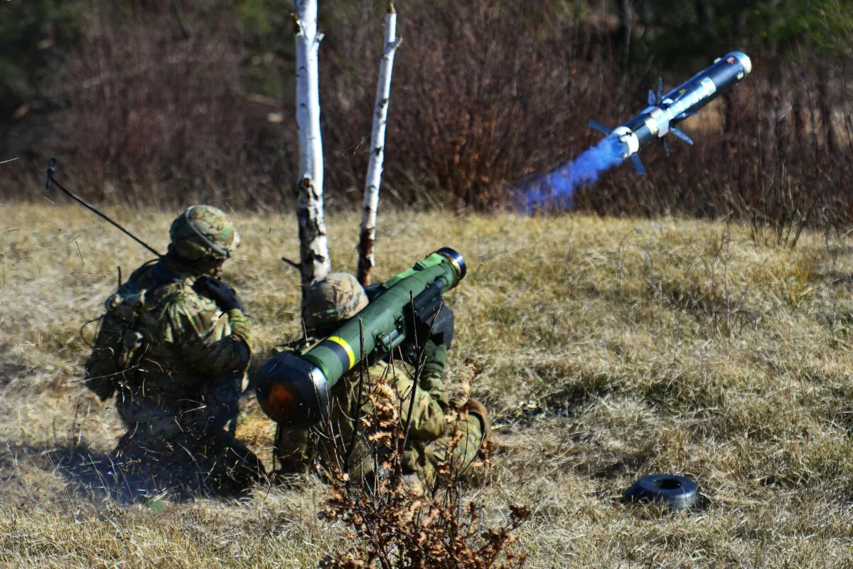 U.S. Army Spc. Fernando Jimenez, right, engages a target with a Javelin shoulder fired anti-tank missile during a live-fire as part of Exercise Rock Sokol at Pocek Range in Postonja, Slovenia, March 9, 2016. (Army photo by Paolo Bovo / Department of Defense)