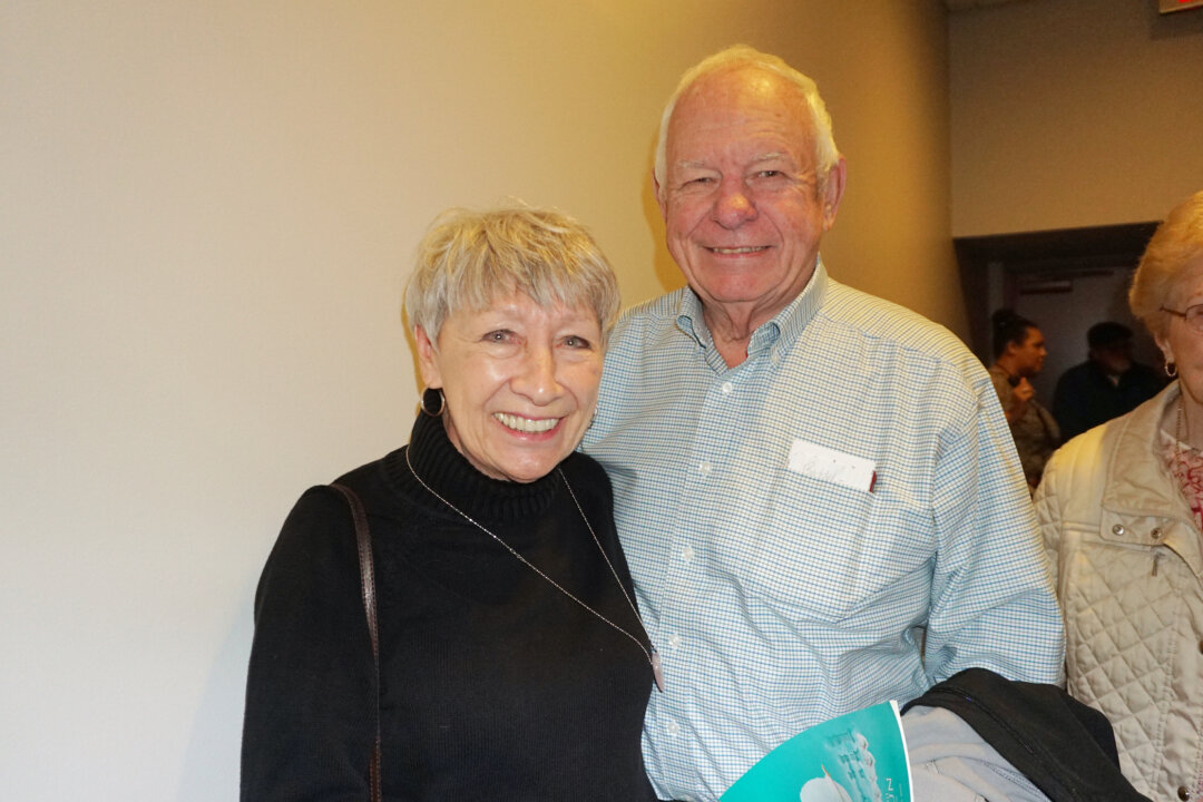 Lynn Ahlden, president of the board for Kankakee Valley Symphony Orchestra, and her companion attended Shen Yun Performing Arts in University Park, Illinois, on March 5, 2020. (Catherine Wen/The Epoch Times)