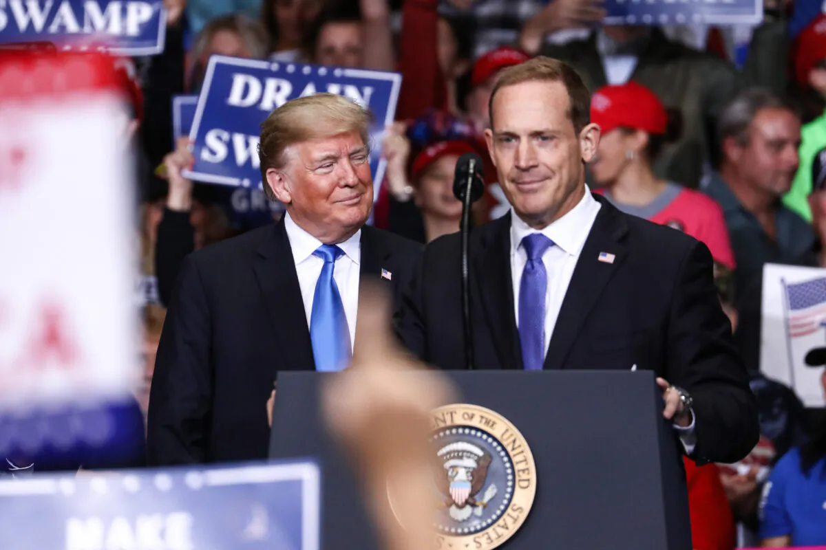 President Donald Trump (L) and GOP congressional candidate Ted Budd at a Make America Great Again rally in Charlotte, N.C., on Oct. 26, 2018. (Charlotte Cuthbertson/The Epoch Times)