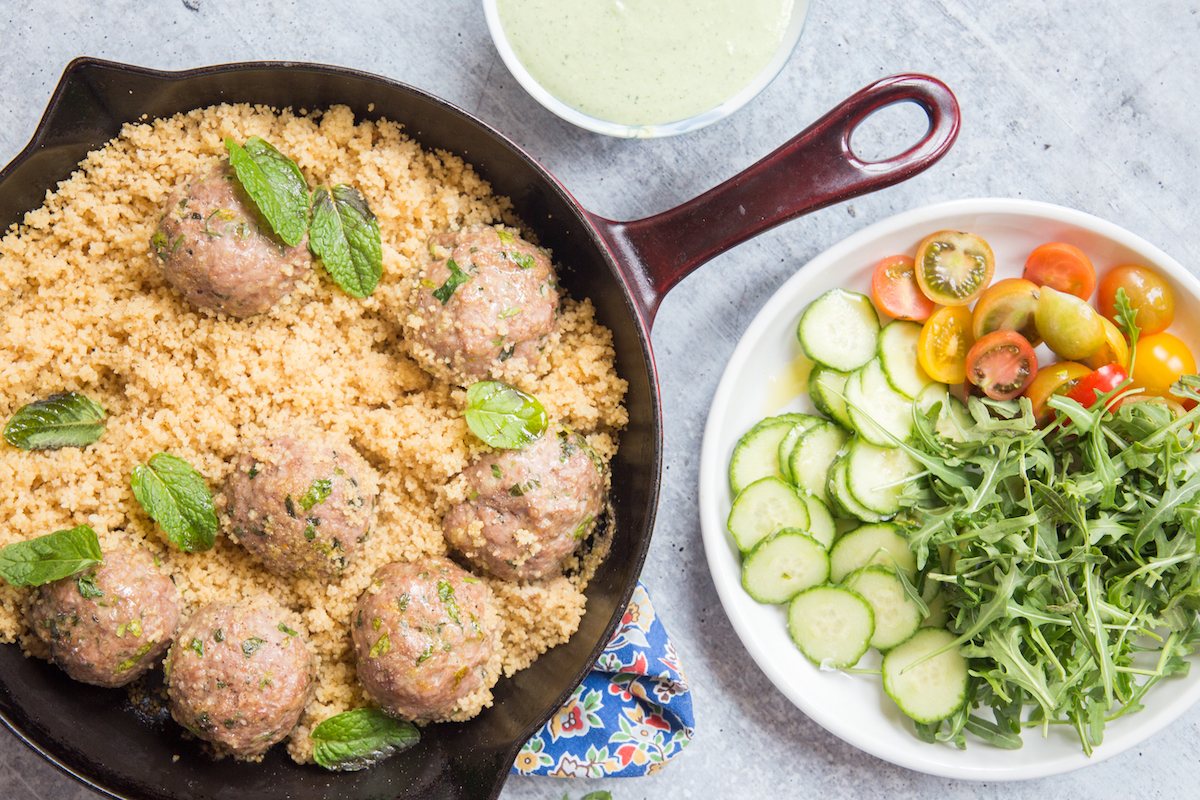 meatballs with couscous and vegetables on the side