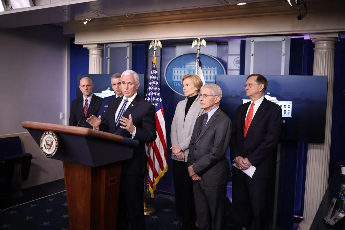 Vice President Mike Pence, center, Director of the National Institute of Allergy and Infectious Diseases Dr. Anthony Fauci, second from right, and other members of the Coronavirus Task Force hold a press briefing at the White House in Washington on March 6, 2020. (Win McNamee/Getty Images)