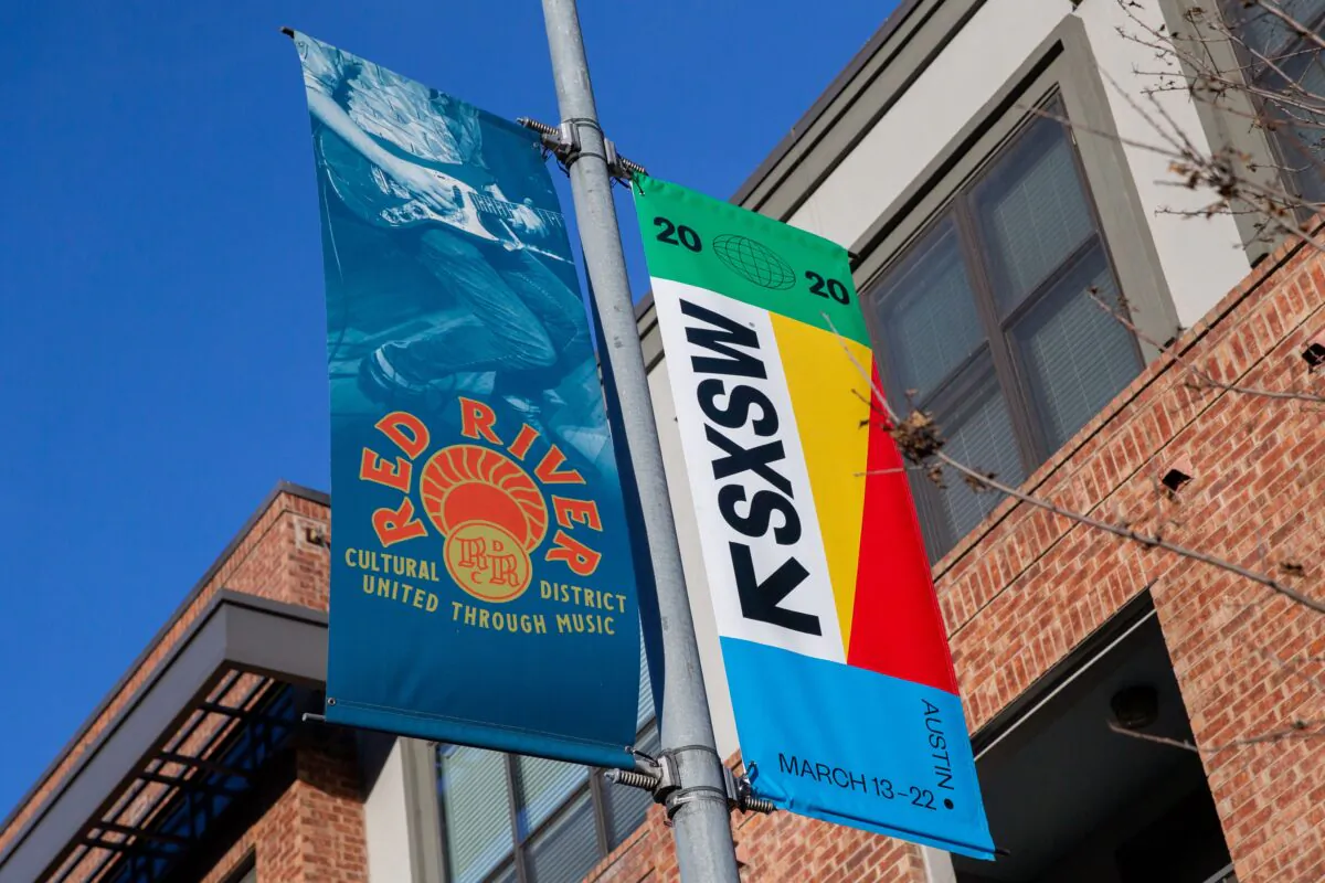 SXSW 2020 banners are seen in the Red River Cultural District  in Austin, Texas, on March 6, 2020. (Suzanne Cordeiro/AFP via Getty Images)