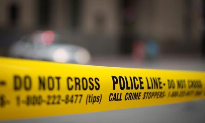 Police tape is shown in a stock photo. (The Canadian Press/Graeme Roy)