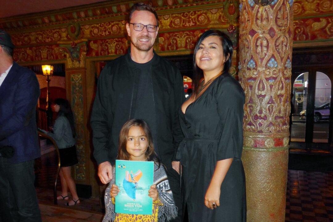 Filmmaking duo Daniel Fallshaw and Violeta Ayala attend Shen Yun Performing Arts at Capitol Theatre in Sydney, Australia, with their daughter Suri, on March 7, 2020. (Mary Yuan/The Epoch Times)