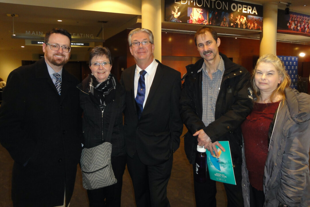 Brad Ray (C) and Brook Edwards (2nd R) attended Shen Yun Performing Arts with family and friends at the Northern Alberta Jubilee Hall in Edmonton, Canada, on March 7, 2020. (Sophia Zhang/The Epoch Times)