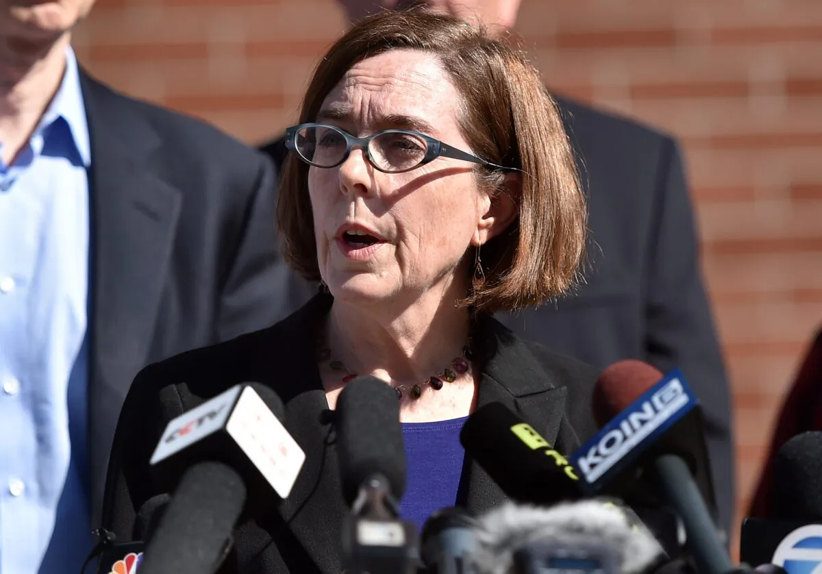 Oregon Governor Kate Brown reacts during a press conference in Roseburg, Oreg., on Oct. 2, 2015. (Josh Edelson/AFP via Getty Images)