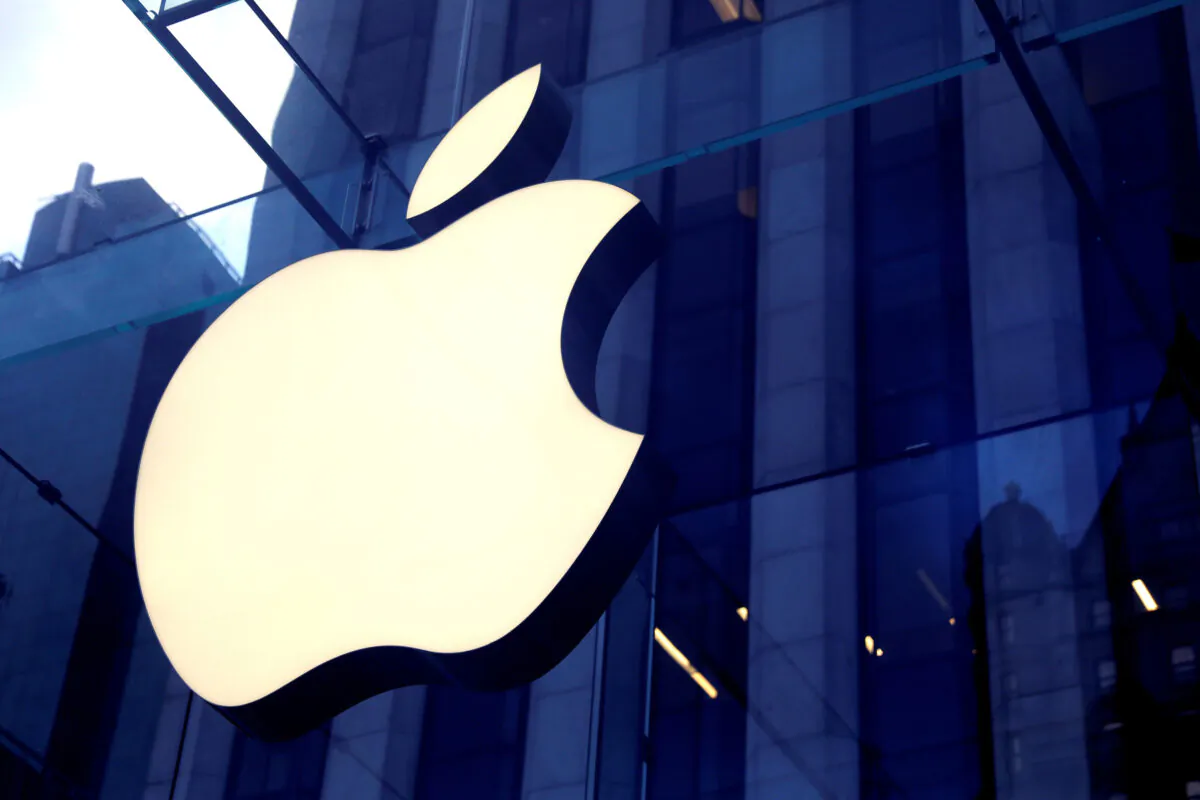 The Apple logo hangs at the entrance to the Apple store on 5th Avenue in Manhattan, New York, on Oct. 16, 2019. (Mike Segar/Reuters)