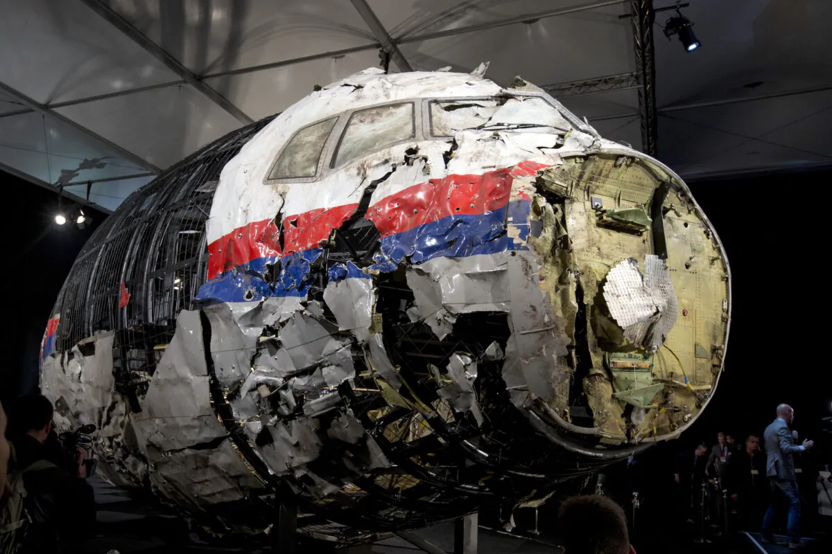 The reconstructed wreckage of Malaysia Airlines Flight MH17, put on display during a press conference in Gilze-Rijen, central Netherlands, on Oct. 13, 2015. (Peter Dejong/AP Photo)