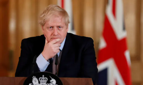 Britain’s Johnson Faces Lawmaker Revolt Over Huawei 5G Decision