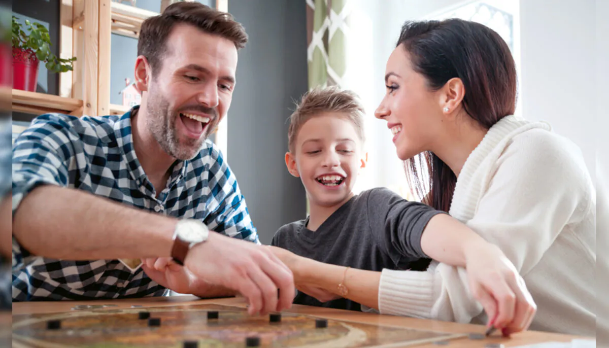 Focused on getting through this crisis, families are playing games, sharing meals, having conversations, and reconnecting. (Leszek Glasner)