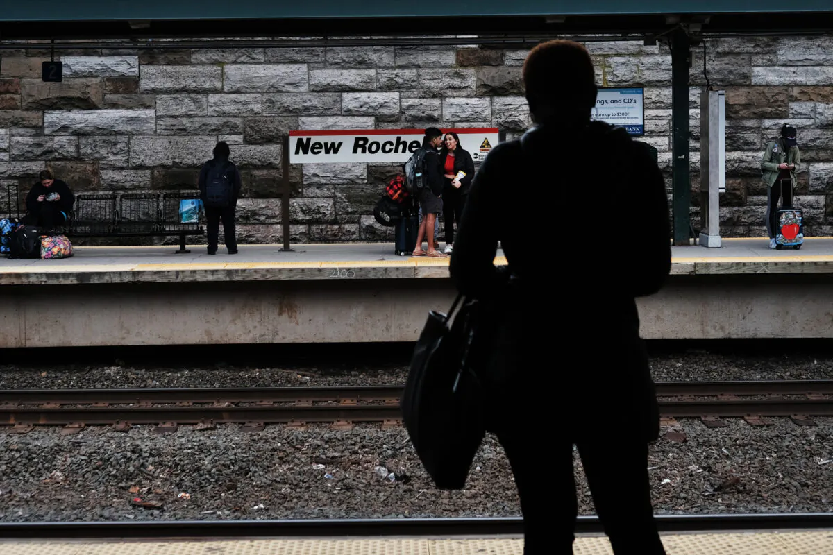 People walk through downtown New Rochelle, New York, on March 10, 2020. (Spencer Platt/Getty Images)