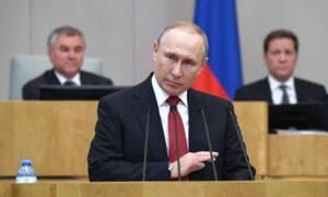 Putin Backs Term-Limit Freeze Allowing Him to Stay in Office