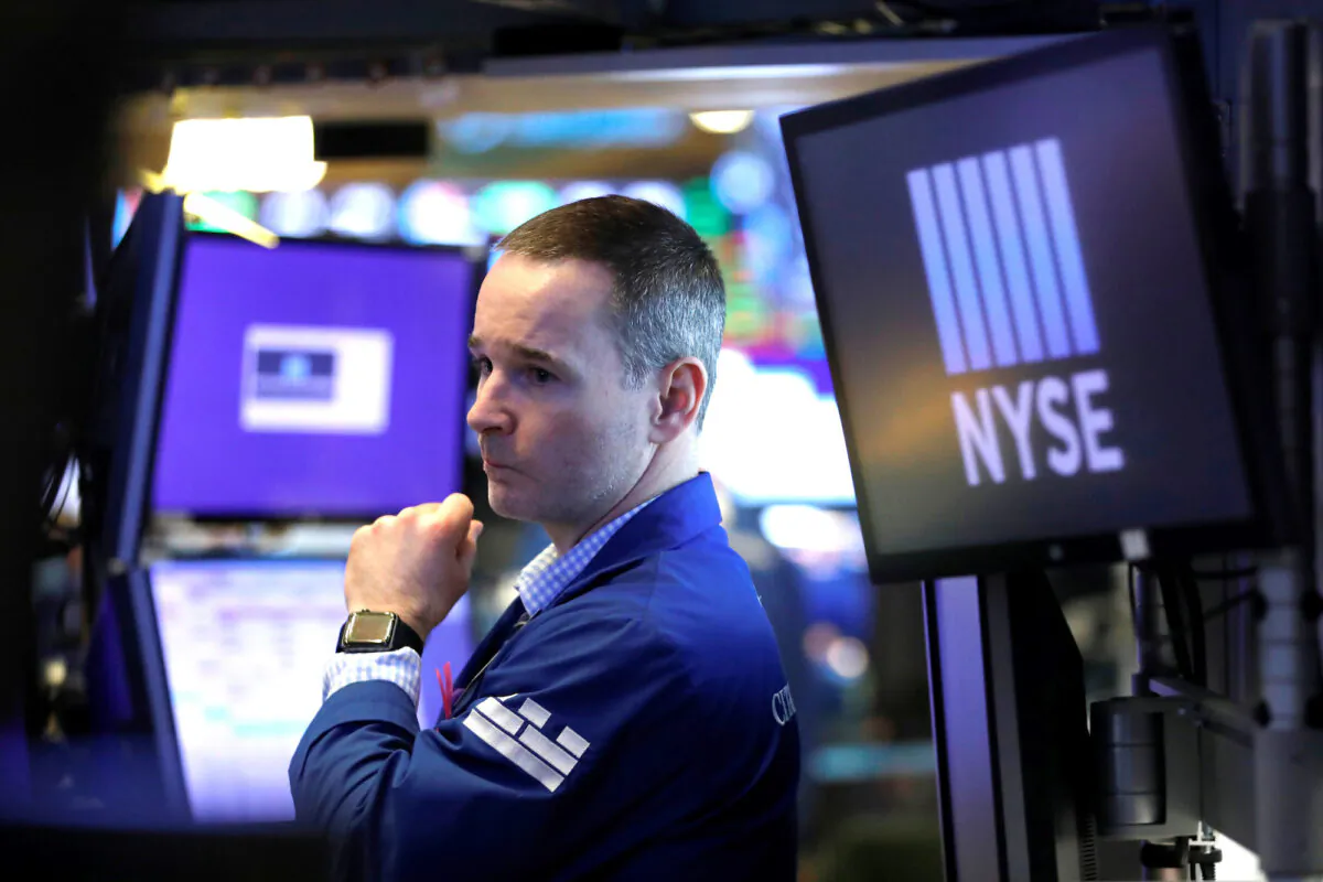 A trader works on the floor of the New York Stock Exchange in New York City on March 10, 2020. (Andrew Kelly/Reuters)
