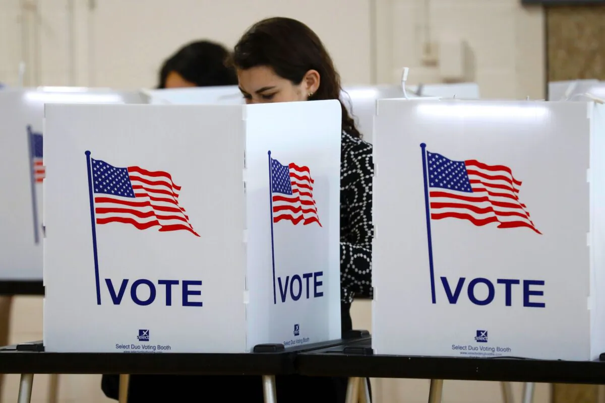 People vote in the Michigan primary election at Chrysler Elementary School in Detroit, Michigan, on March 10, 2020. (Jeff Kowalsky/AFP via Getty Images)
