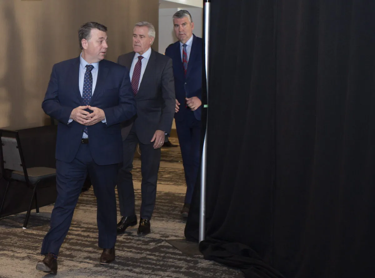 Prince Edward Island Premier Dennis King, Newfoundland and Labrador Premier Dwight Ball, and Nova Scotia Premier Stephen McNeil arrive for a press conference following the Atlantic Premiers Conference at the Emera Innovation Centre in St. John's on Jan. 13, 2020. (Paul Daly/The Canadian Press)