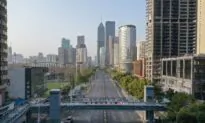 Some Cities in China’s Coronavirus Epicenter Partially Lift Lockdown Measures