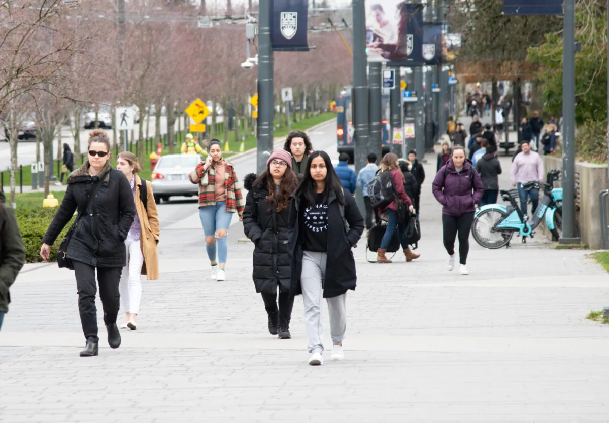 Students walk on the University of British Columbia campus on March 10, 2020. (Jerry Wu/The Epoch Times)
