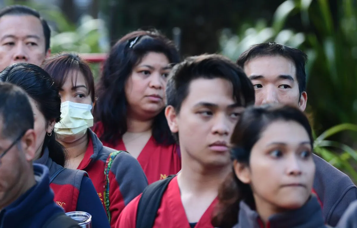 Registered nurses and health care workers rally outside a hospital in a file photo in Los Angeles on March 11, 2020. (Frederic J. Brown/AFP via Getty Images)