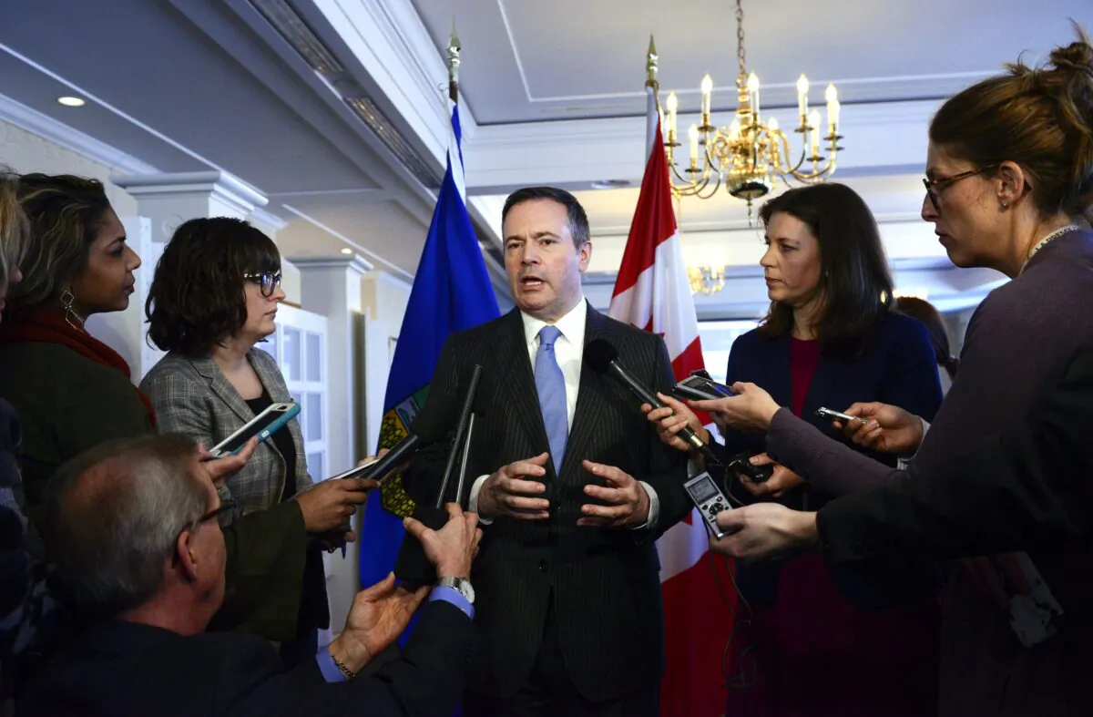 Alberta Premier Jason Kenney speaks reporters after a speech at the Rideau Club in Ottawa on Thursday, March 12, 2020. Kenney says the country needs additional fiscal stimulus “in the range of one per cent of GDP”—roughly $20 billion—to confront the health and economic impacts of the novel coronavirus. (The Canadian Press/Sean Kilpatrick)