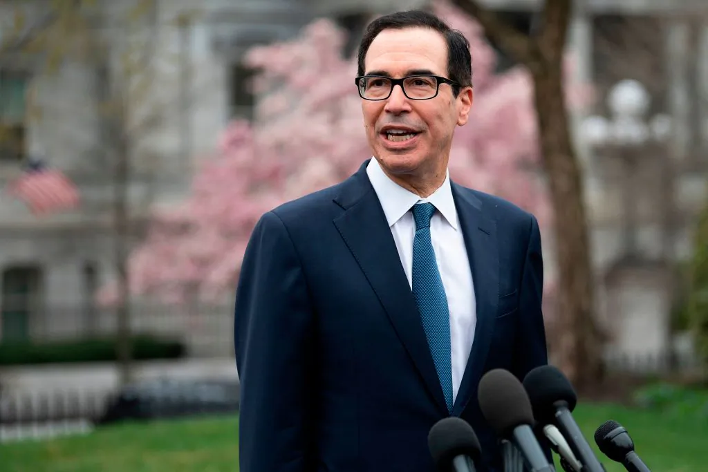 Treasury Secretary Steven Mnuchin speaks with reporters outside White House in Washington, DC, on March 13, 2020. (Jim Watson/AFP/Getty Images)
