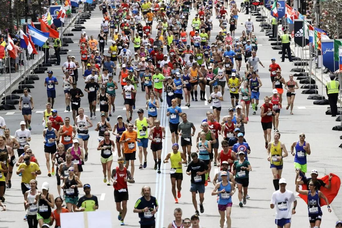 Runners in the 121st Boston Marathon head down the stretch to the finish line in Boston, on April 17, 2017. (Charles Krupa/AP Photo)