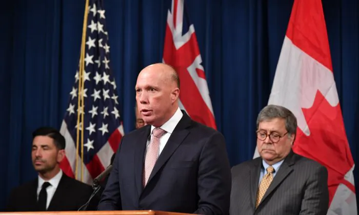 Australia's Minister for Home Affairs Peter Dutton announces measures against online sexual exploitation during a press conference at the Department of Justice in Washington on March 5, 2020. (MANDEL NGAN/AFP via Getty Images)
