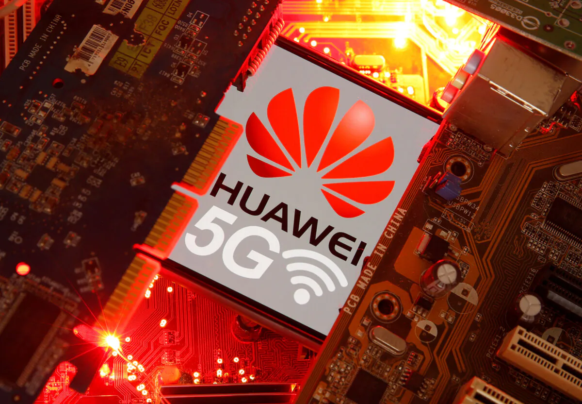A smartphone with the Huawei and 5G network logo is seen on a PC motherboard in this illustration picture taken on Jan. 29, 2020. (Dado Ruvic/Illustration/Reuters)
