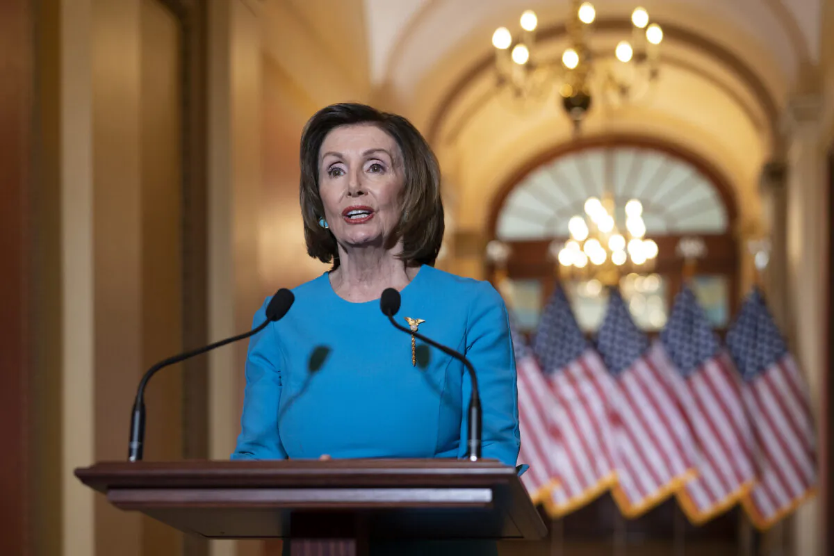 Speaker of the House Nancy Pelosi (D-Calif.) makes a statement about a coronavirus aid package, on Capitol Hill in Washington, on March 13, 2020. (AP Photo/J. Scott Applewhite)