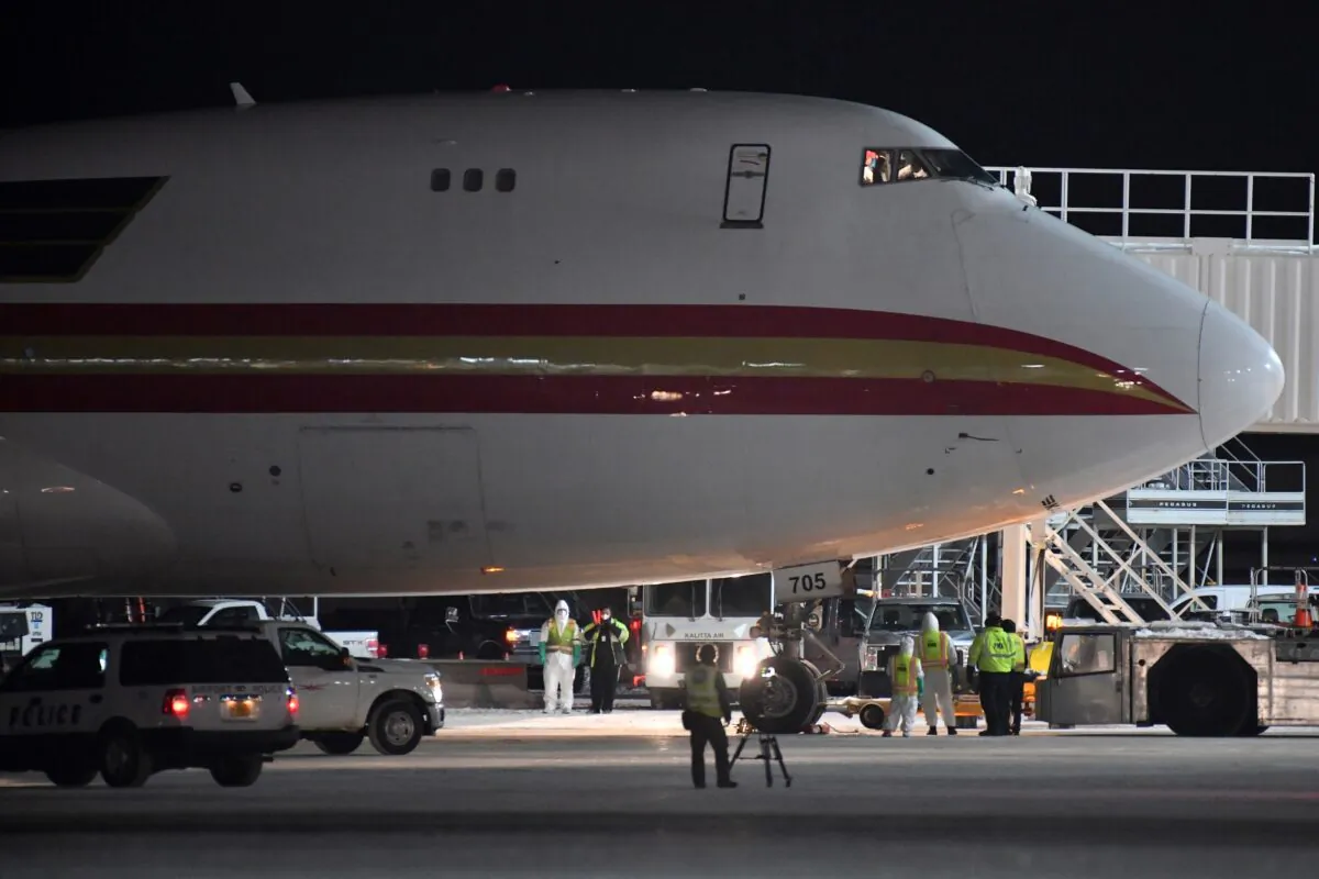 A plane carrying Americans evacuated from Wuhan, China arrives at Ted Stevens Anchorage International Airport in Anchorage, Alaska on Jan. 28, 2020. The state on March 12, 2020, reported its first confirmed coronavirus case. (Lance King/Getty Images)