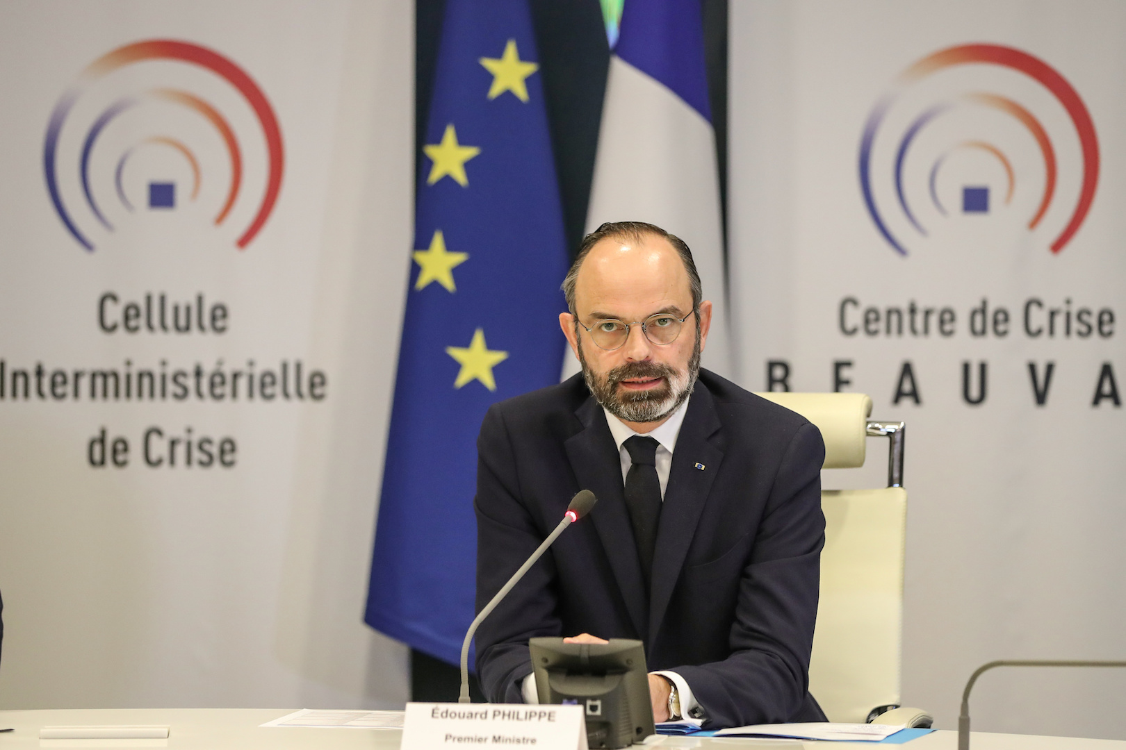 French Prime Minister Edouard Philippe chairs a video meeting with French regions prefects on the coronavirus in the "crisis room" of the French Interior ministry