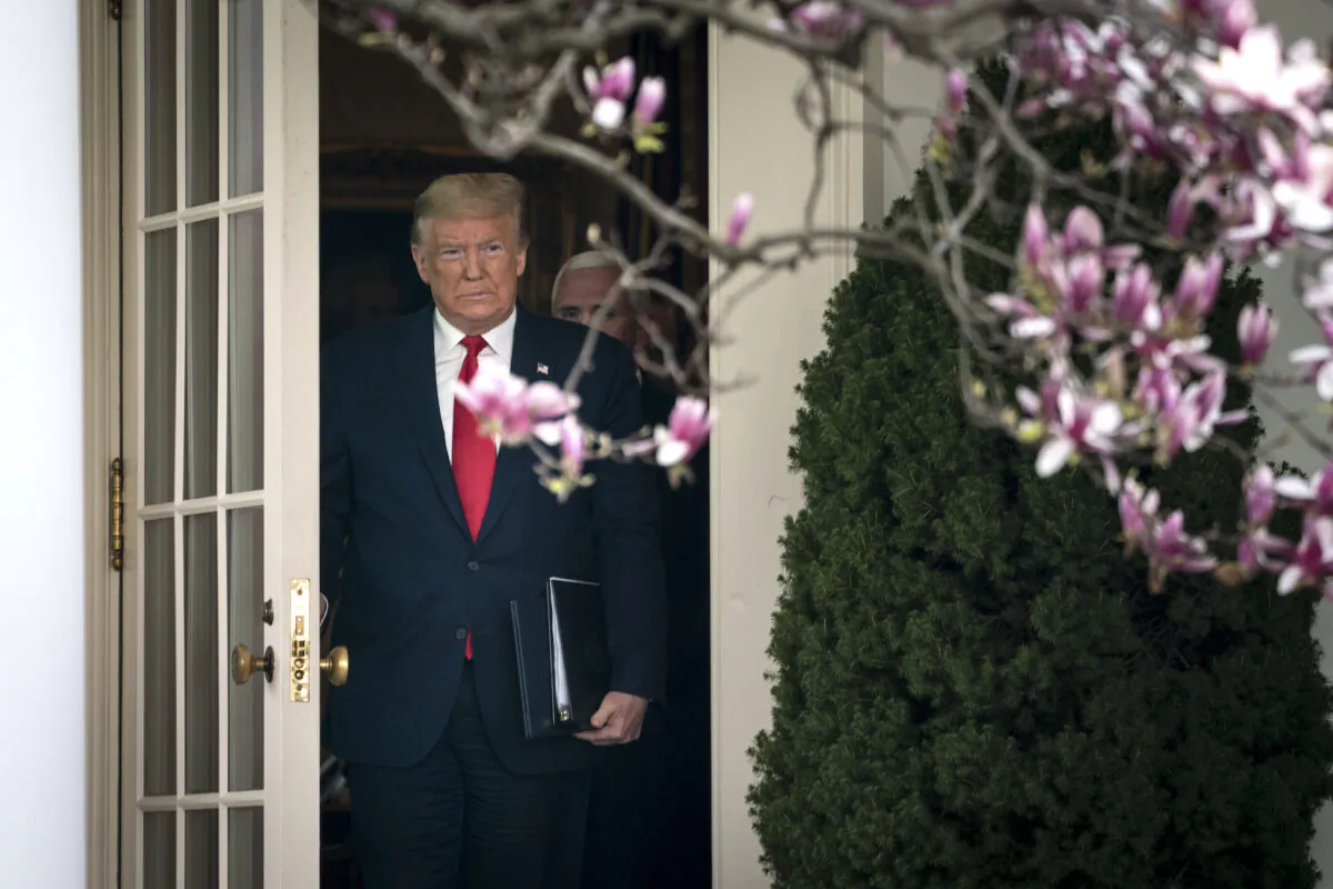 President Donald Trump exits the Oval Office and walks to a news conference about the ongoing global coronavirus pandemic in the Rose garden at the White House in Washington, DC on March 13, 2020. (Drew Angerer/Getty Images)