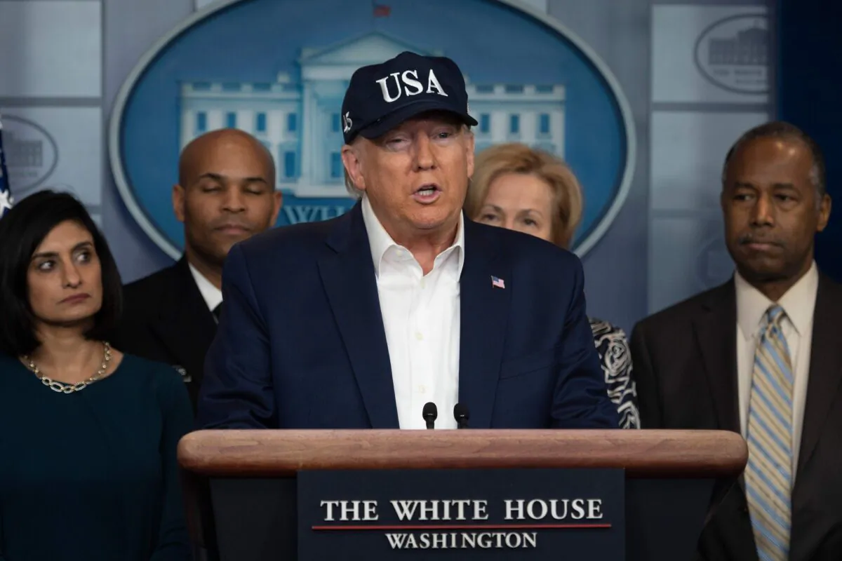 President Donald Trump gives a press briefing about the Coronavirus (COVID-19) alongside members of the Coronavirus Task Force in the Brady Press Briefing Room at the White House in Washington on March 14, 2020. (Jim Watson/AFP via Getty Images)