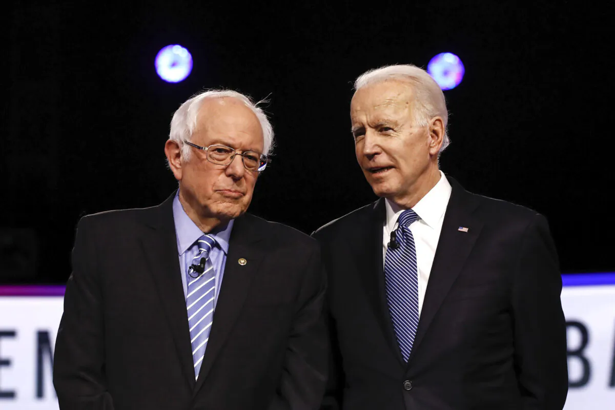 Democratic presidential candidates Sen. Bernie Sanders (I-Vt.), left, and former Vice President Joe Biden, participate in a Democratic presidential primary debate in Charleston, S.C., on Feb. 25, 2020. (Matt Rourke/AP Photo)