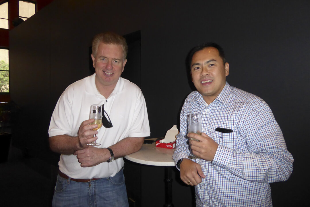 Theatergoers Mark Burns (L) and Mark Chai (R) attended Shen Yun Performing Arts at the Capitol Theatre, in Sydney, on March 14, 2020. (The Epoch Times)