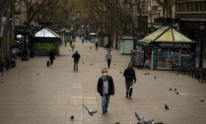 Daily Life Near a Standstill as Nations Try to Halt Pandemic