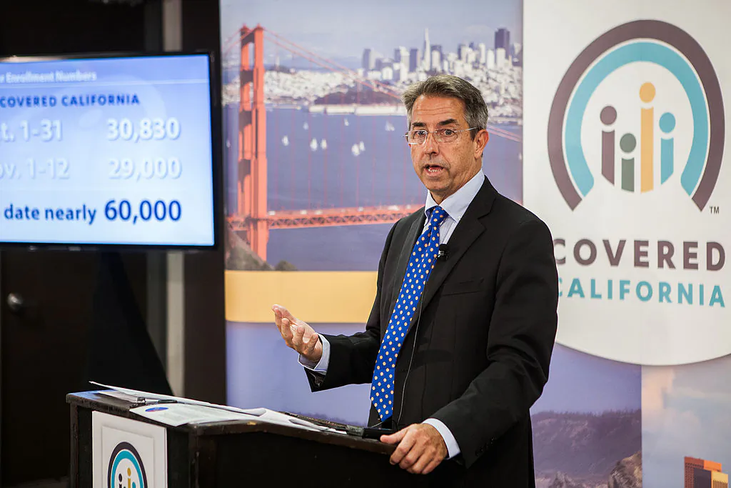 Covered California Executive Director Peter Lee speaks during a press conference regarding the number of new healthcare enrollees through CoveredCA.com, the health insurance exchange for the state of California, in Sacramento, Calif., on Nov. 13, 2013. (Photo by Max Whittaker/Getty Images)