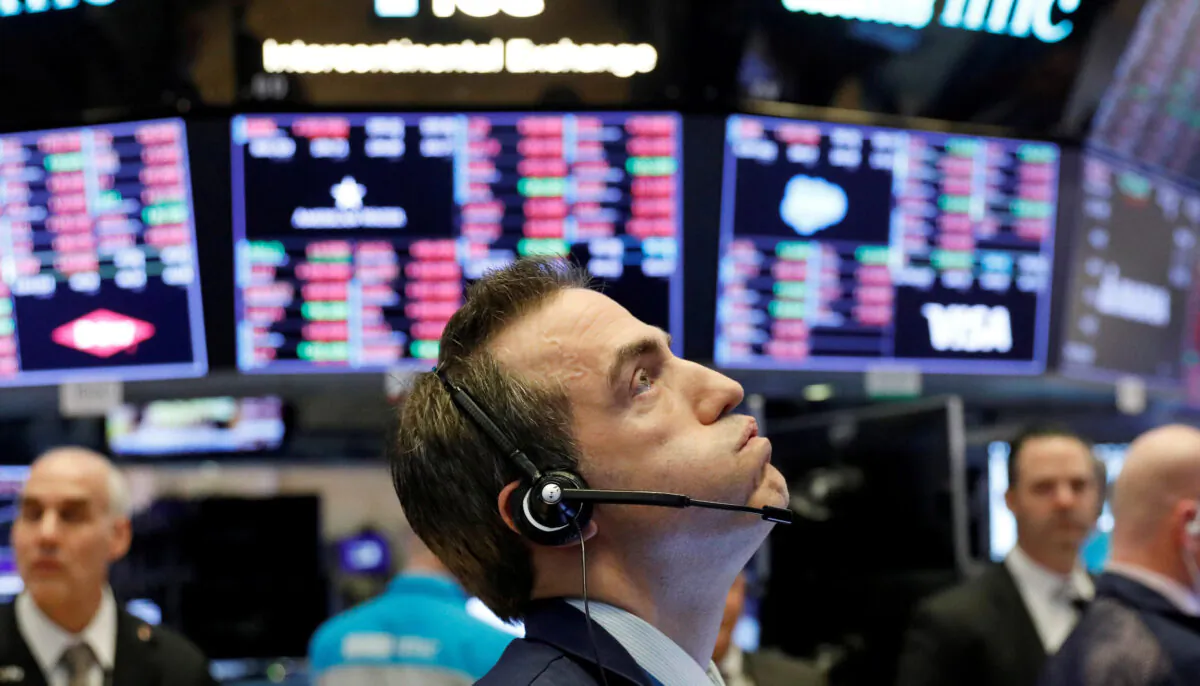 A trader works on the floor of the New York Stock Exchange shortly before the closing bell in New York, on Feb. 25, 2020. (Reuters/Lucas Jackson)