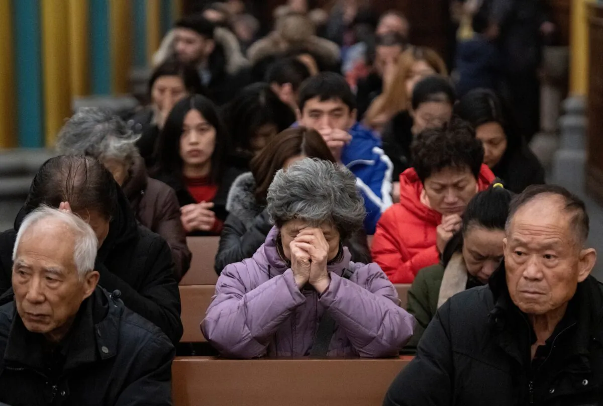 Worshippers attend a mass at the Xishiku Cathedral in Beijing, China in this file photo. (Noel Celsis/AFP via Getty Images)