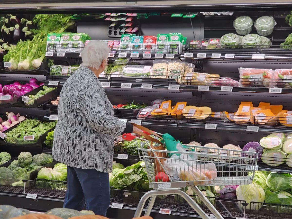 A woman shops in the fresh produce section of a supermarket in Albany, Western Australia, on Oct. 15, 2024. (Susan Mortimer/The Epoch Times)
