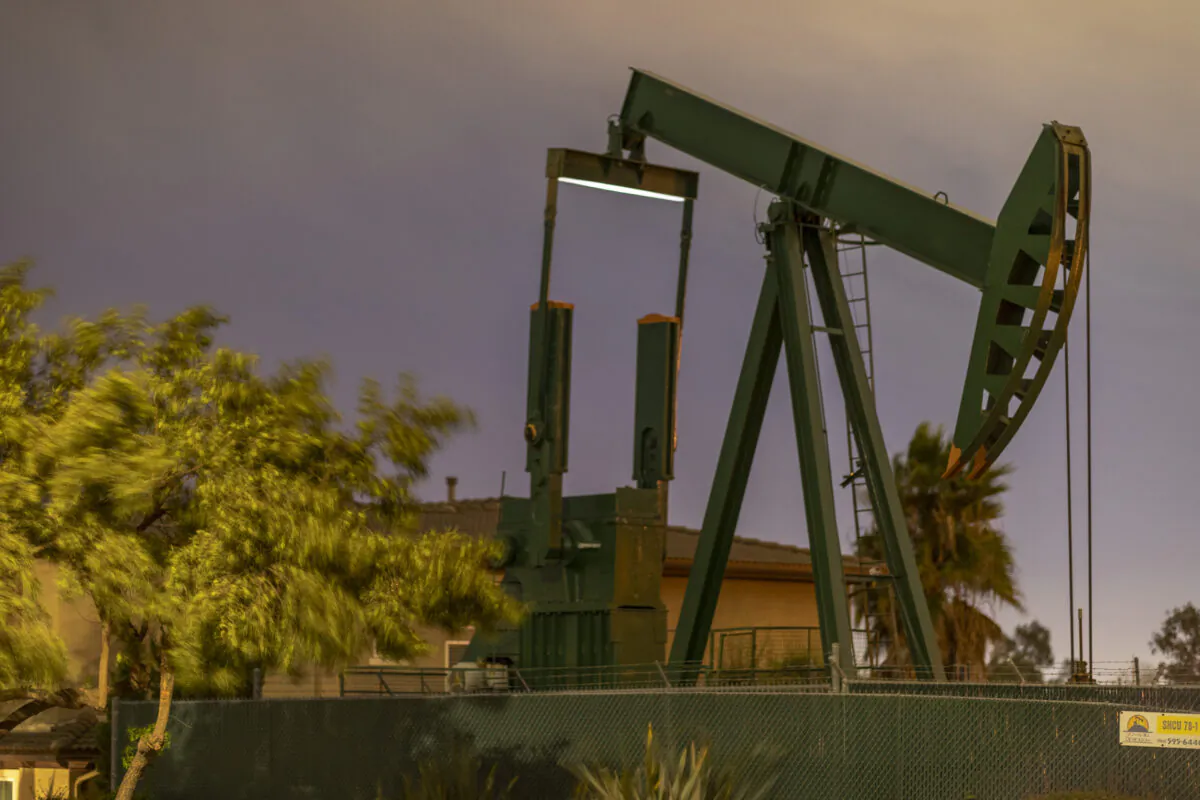Pump jacks draw crude oil from the Long Beach Oil Field under Discovery Well Park in Signal Hill, Calif., on March 9, 2020. (David McNew/AFP via Getty Images)