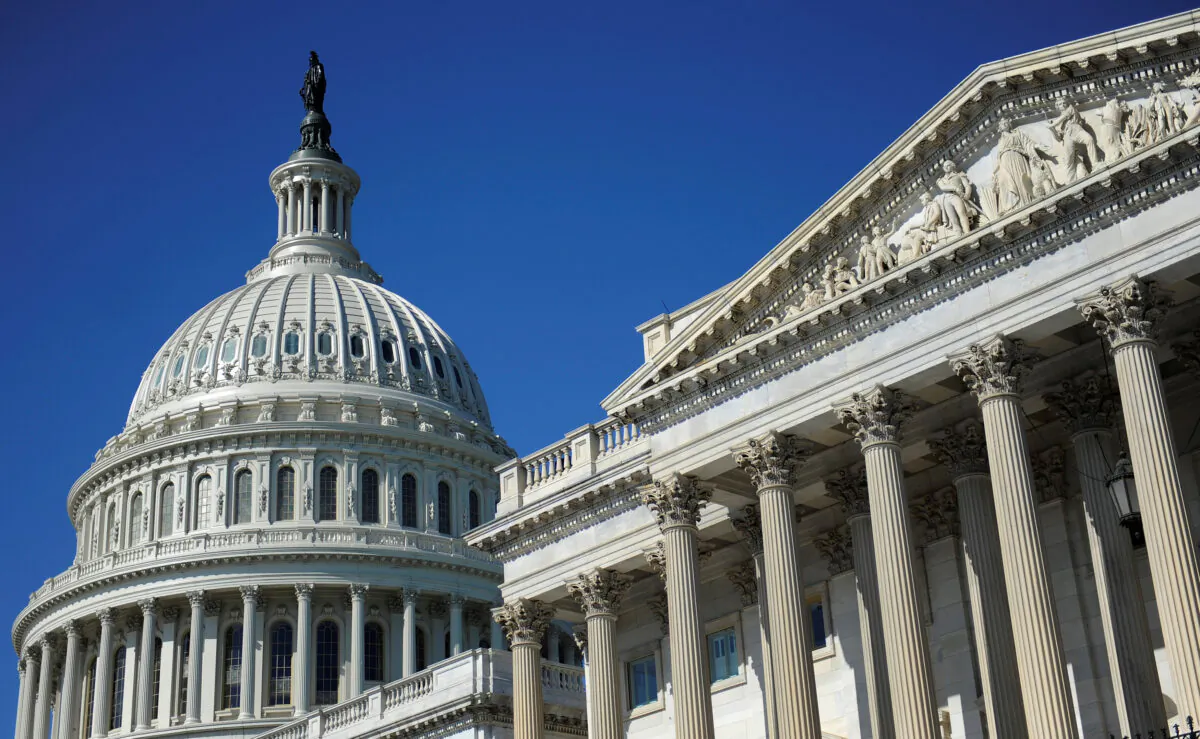 The U.S. Capitol dome and U.S. Senate (R) in Washington, on Aug. 2, 2011. (Jonathan Ernst/Reuters)