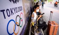Olympic Torch Relay Goes On; Tokyo Seeks Crowd ‘Restraint’