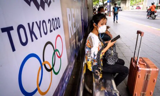 Olympic Torch Relay Goes On; Tokyo Seeks Crowd ‘Restraint’