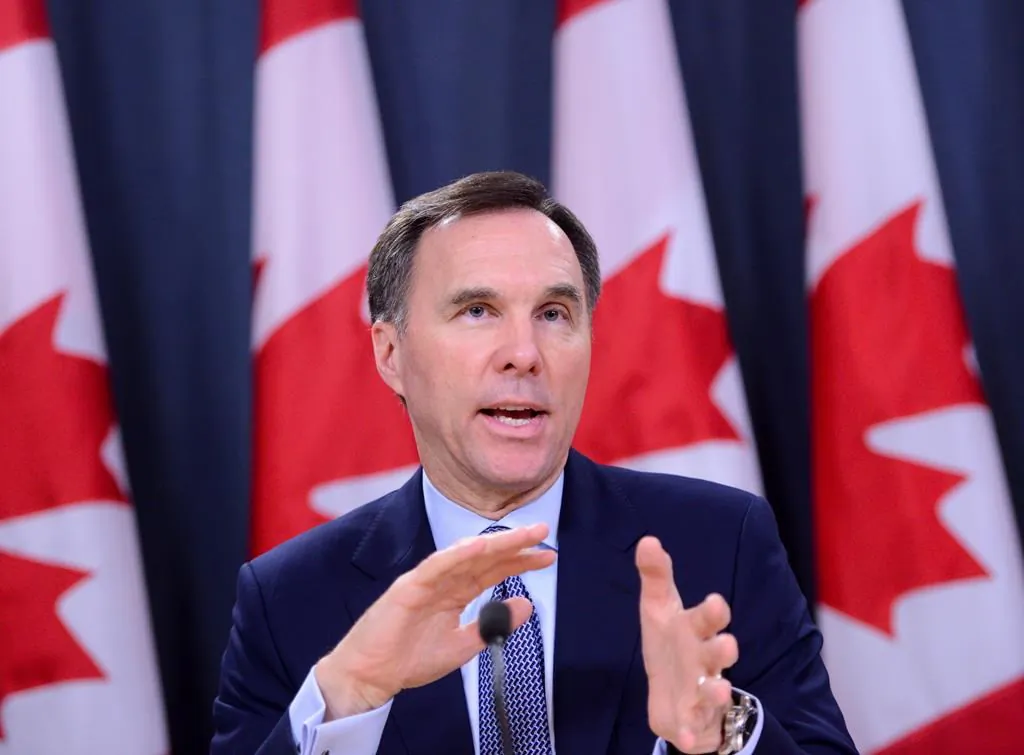 Minister of Finance Bill Morneau takes part in a press conference at the National Press Theatre in Ottawa on March 13, 2020. (The Canadian Press/Sean Kilpatrick)