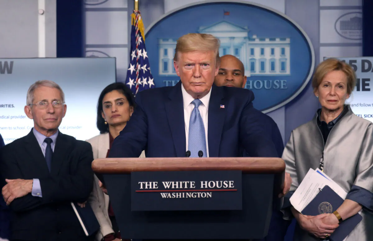 President Donald Trump holds a news briefing on the coronavirus outbreak while accompanied by members of the coronavirus (COVID-19) task force at the White House in Washington on March 16, 2020. (Leah Millis/Reuters)