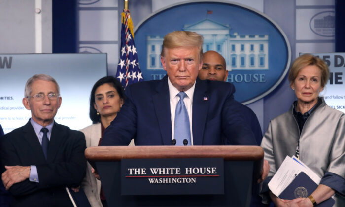 President Donald Trump holds a news briefing on the coronavirus outbreak while accompanied by members of the coronavirus (COVID-19) task force at the White House in Washington on March 16, 2020. (Leah Millis/Reuters)