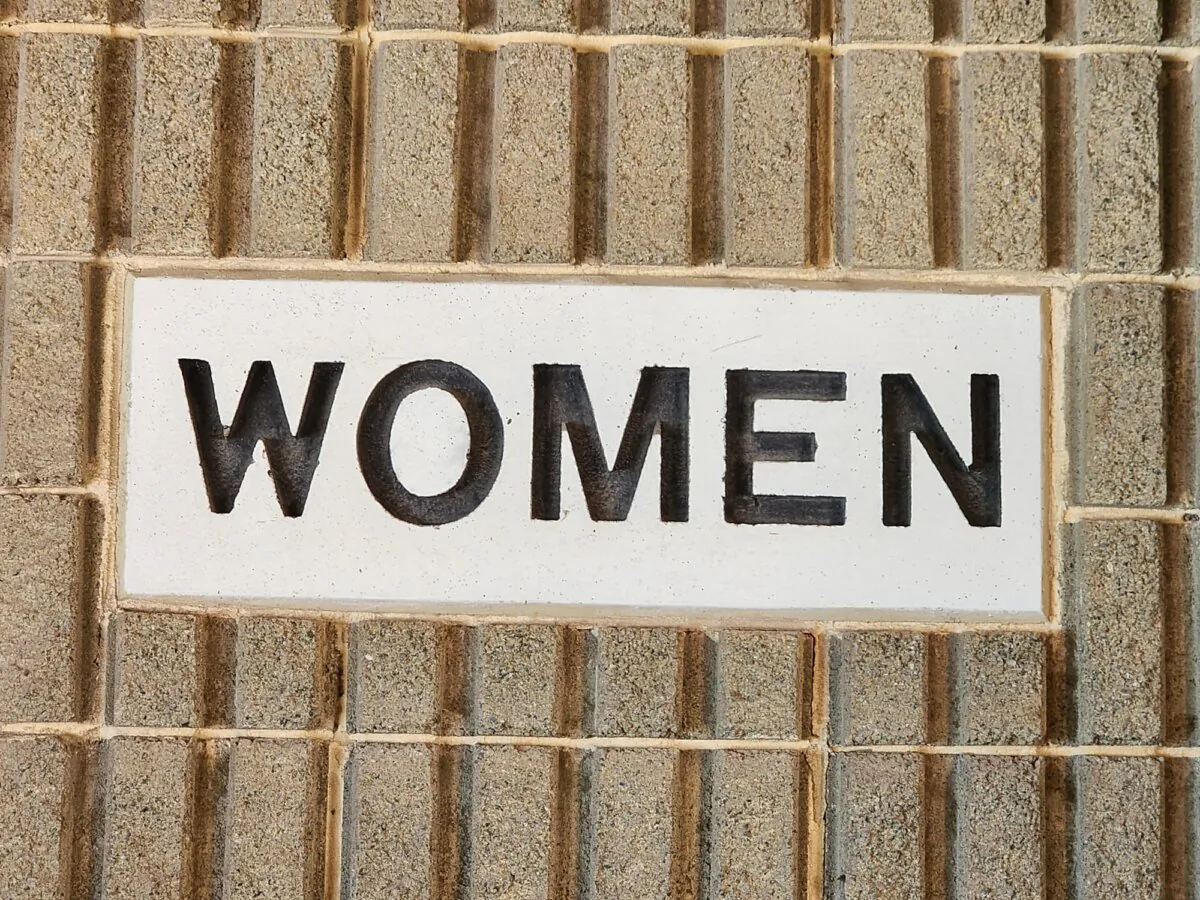 A women sign is seen on a toilet block at Cottesloe Beach in Perth, Western Australia, on March 16, 2024. (Susan Mortimer/The Epoch Times)