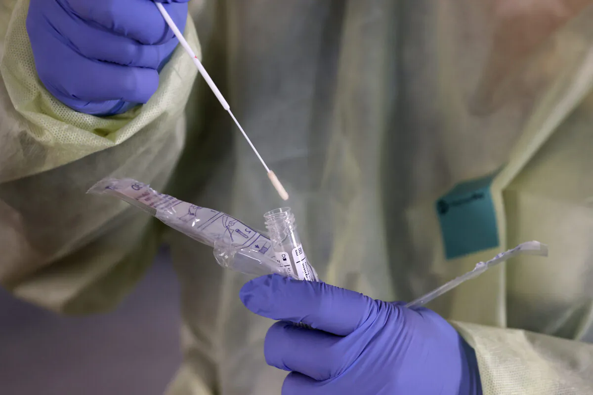 A sample taken from a person tested for the new coronavirus is seen at a drive-through station at Caroll Hospital's parking garage in Westminster, Maryland, on March 16, 2020. (Chip Somodevilla/Getty Images)